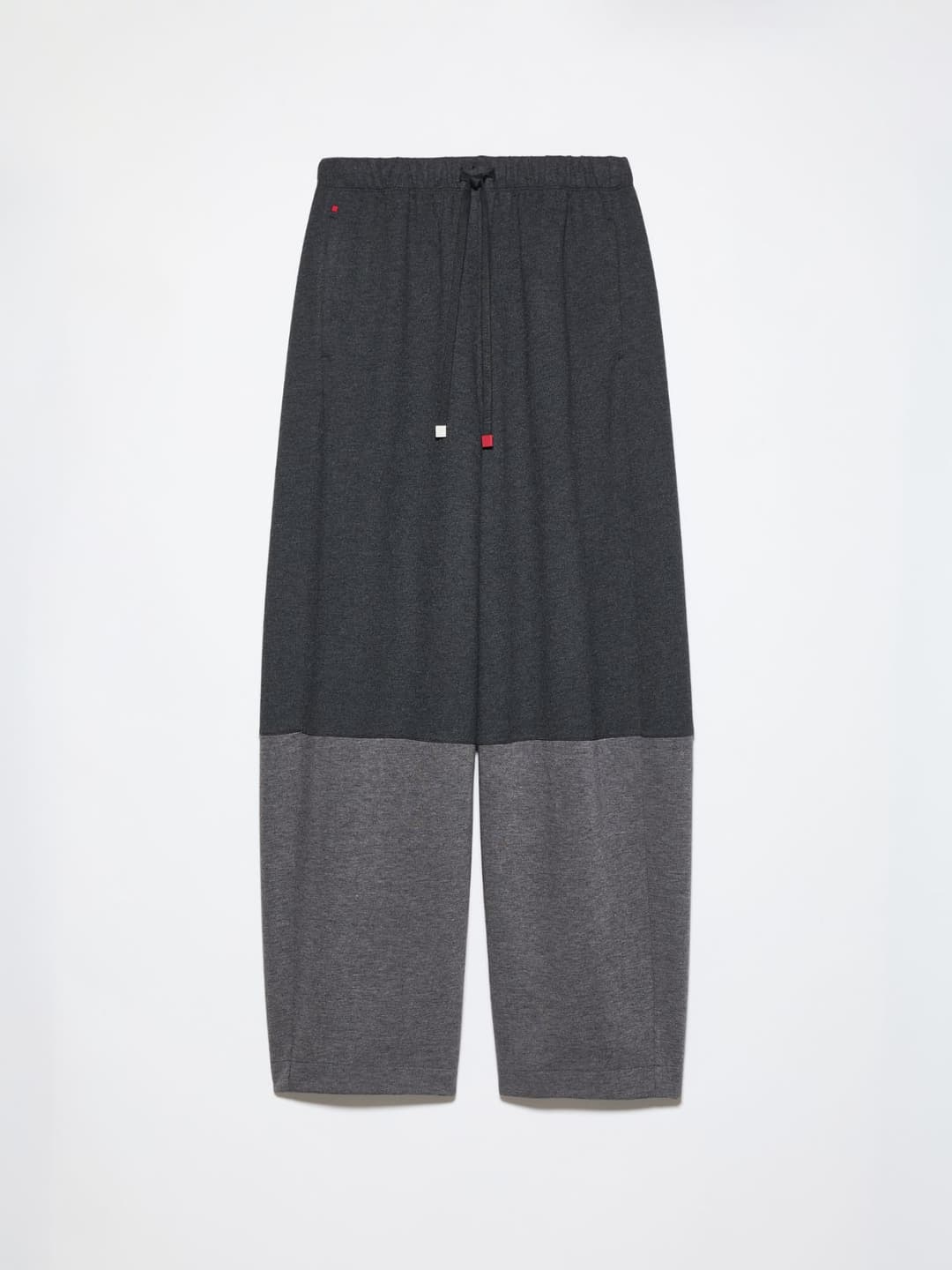 Pantaloni ampi in jersey flanella | Max&Co Pantaloni ampi in jersey flanella nero con gamba barrel leg, vita con elastico e coulisse, dettagli metallici e blocchi di colore. | Max&Co